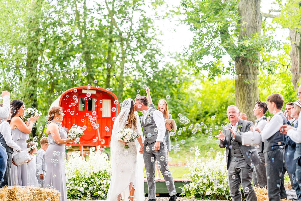 Megan & Lewis Gorgeous PapaKåta Tipi Tent Wedding at Markington Hall, North Yorkshire. Photographed by Joe Dodsworth Photography; Kiss the Bride!