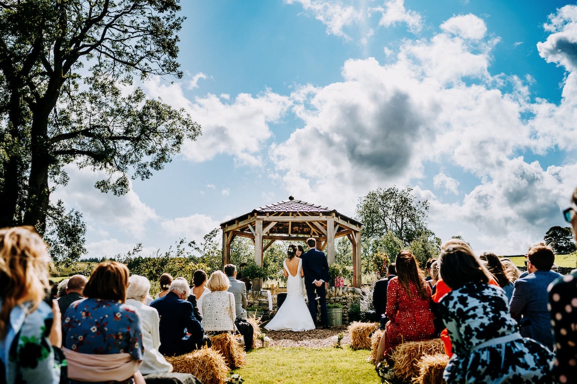 Amy & Dom Stunning PapaKåta Tipi Tent Wedding in Kilnsey Park, Yorkshire Dales. Steve Bridgwood Photography; Summer Wedding Ceremony