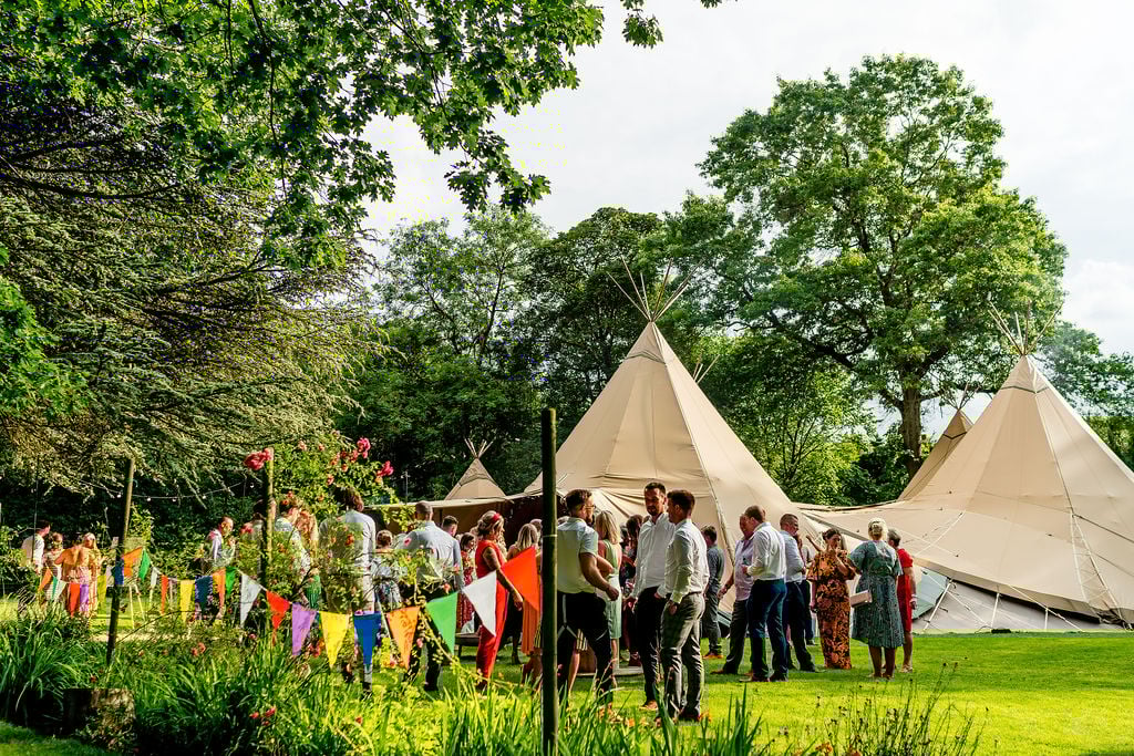 Megan & Lewis Gorgeous PapaKåta Tipi Tent Wedding at Markington Hall, North Yorkshire. Photographed by Joe Dodsworth Photography; Tipi Wedding Party